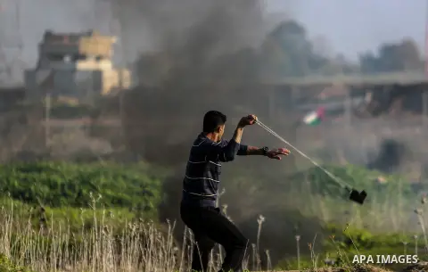 Palestinian protesters clash with Israeli security forces near the border with Israel, east of Gaza City on February 2, 2018 as demonstrations continue over the US president's controversial recognition of Jerusalem as Is...