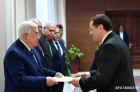 Palestinian President Mahmoud Abbas receives the credentials of the Ambassador of the Arab Republic of Egypt Issam Moawad to the State of Palestine, in the West Bank city of Ramallah on February 5, 2018. Photo by Thaer G...