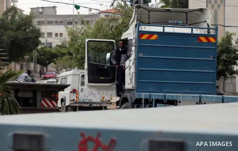 Palestinian truck drivers take part in a protest against the siege on the Gaza Strip, on February 6, 2018 in Gaza City. Israel has maintained a siege on Gaza for a decade which it says is necessary to limit Hamas, the Is...