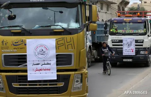 Palestinian truck drivers take part in a protest against the siege on the Gaza Strip, on February 6, 2018 in Gaza City. Israel has maintained a siege on Gaza for a decade which it says is necessary to limit Hamas, the Is...