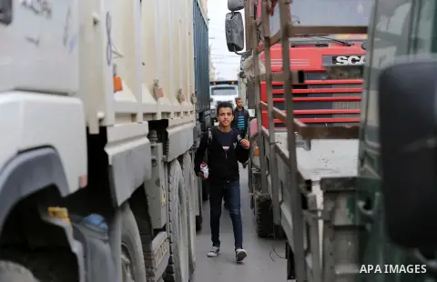 Palestinian truck drivers take part in a protest against the siege on the Gaza Strip, on February 6, 2018 in Gaza City. Israel has maintained a siege on Gaza for a decade which it says is necessary to limit Hamas, the Is...