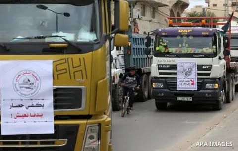 Palestinian truck drivers take part in a protest against the siege on the Gaza Strip, on February 6, 2018 in Gaza City. Israel has maintained a siege on Gaza for a decade which it says is necessary to limit Hamas, the Is...
