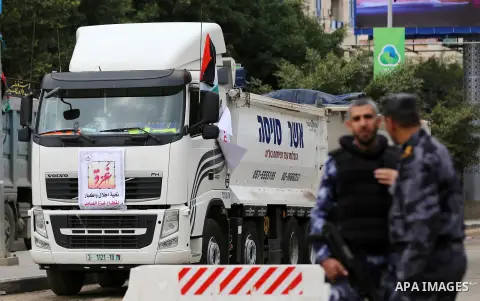 Palestinian truck drivers take part in a protest against the siege on the Gaza Strip, on February 6, 2018 in Gaza City. Israel has maintained a siege on Gaza for a decade which it says is necessary to limit Hamas, the Is...