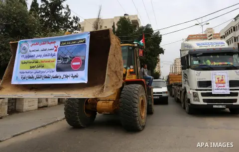 Palestinian truck drivers take part in a protest against the siege on the Gaza Strip, on February 6, 2018 in Gaza City. Israel has maintained a siege on Gaza for a decade which it says is necessary to limit Hamas, the Is...