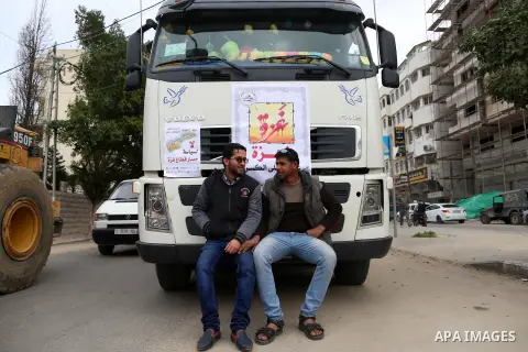 Palestinian truck drivers take part in a protest against the siege on the Gaza Strip, on February 6, 2018 in Gaza City. Israel has maintained a siege on Gaza for a decade which it says is necessary to limit Hamas, the Is...