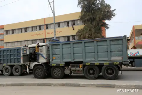 Palestinian truck drivers take part in a protest against the siege on the Gaza Strip, on February 6, 2018 in Gaza City. Israel has maintained a siege on Gaza for a decade which it says is necessary to limit Hamas, the Is...