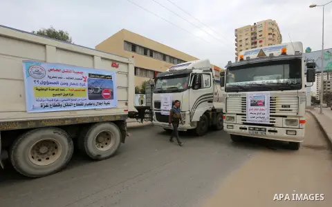 Palestinian truck drivers take part in a protest against the siege on the Gaza Strip, on February 6, 2018 in Gaza City. Israel has maintained a siege on Gaza for a decade which it says is necessary to limit Hamas, the Is...