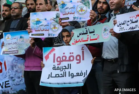 Palestinian take part during a protest against Trump's decision to recognize Jerusalem as the capital of Israel, in Gaza city on February 16, 2018. US President Donald Trump has reiterated that the issue of Jerusalem is...