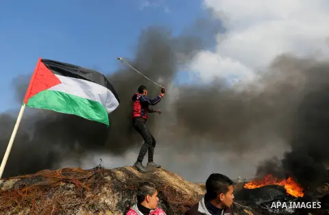 Palestinian protesters clash with Israeli security forces as demonstrations continue over US President Donald Trump's declaration of Jerusalem as Israel's capital near the border with Israel in the southern Gaza Strip Fe...