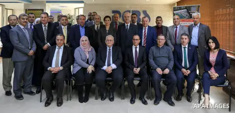 Palestinian Prime Minister Rami Hamdallah chairs the 20th Meeting of the Advisory Council for Official Statistics in the West Bank city of Ramallah, on February 22, 2018. Photo by Prime Minister Office