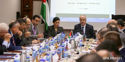 Palestinian Prime Minister Rami Hamdallah chairs the 20th Meeting of the Advisory Council for Official Statistics in the West Bank city of Ramallah, on February 22, 2018. Photo by Prime Minister Office