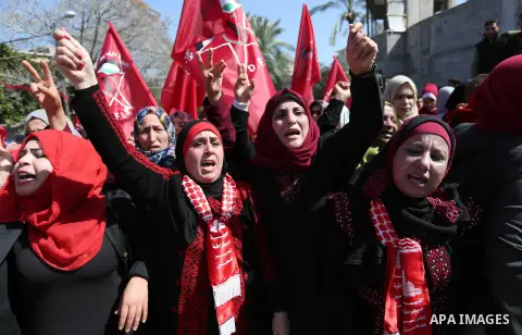 Palestinian supporters of the Democratic Front for the Liberation of Palestine (DFLP) take part in a rally marking the 49th anniversary of DFLP foundation in Gaza city on February 22, 2018. Photo by Ashraf Amra