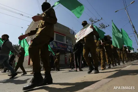 Palestinian supporters of Hamas movement take part in a protest against Trump's decision to recognize Jerusalem as the capital of Israel, at Nuseirat refugee camp, in the central of Gaza Strip on February 23, 2018. US Pr...
