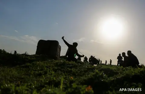 Palestinian protesters clash with Israeli security forces near the border fence with Israel, east of Gaza City on February 23, 2018. Photo by Mohammed Dahman