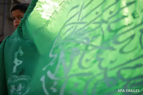 Palestinian supporters Hamas movement take part during a protest against U.S. President Donald Trump's decision to recognise Jerusalem as the capital of Israel, in Beit Lahia in in northern Gaza Strip on March 2, 2018. P...