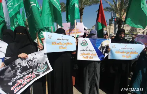 Palestinian women supporter Hamas movement take part in a rally on the occasion of International Women's Day, in Gaza city, on March 7, 2018. Photo by Mahmoud Ajour