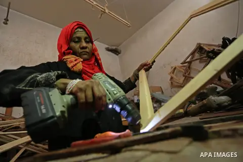 Amel Abu Rgayeg, a 40 years old Palestinian refugee carpenter, works in her small carpentry workshop, at al-Nusairat refugee camp in the central Gaza Strip, 08 March 2018. Amel was married to a man from the Arab citizens...
