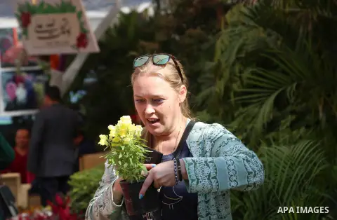 Egyptians visit the spring flower exhibition held at Orman Botanical Garden in Giza, Egypt, on March 10, 2018. Photo by Amr Sayed