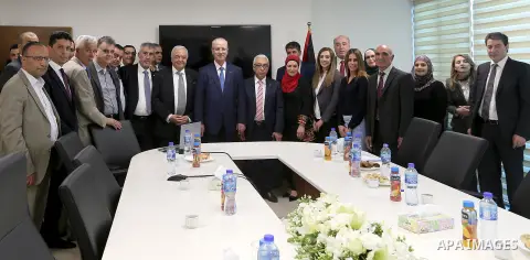 Palestinian Prime Minister Rami Hamdallah visits the Social Security Institution, in the West Bank city of Ramallah on March 26, 2018. Photo by Prime Minister Office