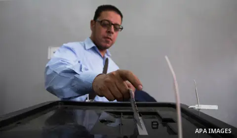 An Egyptian man casts his vote on the third day of the presidential election at a polling station, in Cairo, Egypt, on March 28, 2018. Egyptians head to the polls in a three-day vote to choose between incumbent Abdel Fat...