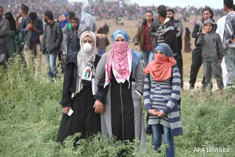 Palestinians take part in a tent city protest along the Israel border with Gaza, demanding the right to return to their homeland, east of Jabalia, in the northern of Gaza Strip on March 30, 2018. Photo by Mahmoud Ajour