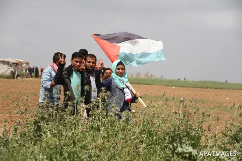 Palestinians take part in a tent city protest along the Israel border with Gaza, demanding the right to return to their homeland, east of Jabalia, in the northern of Gaza Strip on March 30, 2018. Photo by Mahmoud Ajour