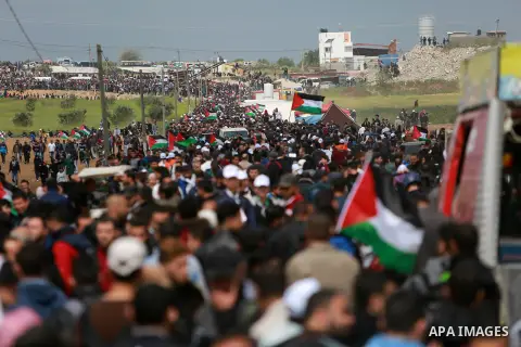 Palestinians take part in a tent city protest along the Israel border with Gaza, demanding the right to return to their homeland, east of Gaza City March 30, 2018. Photo by Mohammed Dahman
