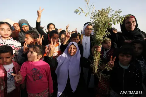 Palestinian women take part during a tent city protest along the Israel border with Gaza, demanding the right to return to their homeland, in Jabalia in the northern of Gaza strip on April 4, 2018. Photo by Mahamoud Ajou...