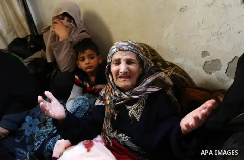 Relatives of Palestinian Alaa al-Zamili, 15, who who died the day before during clashes with Isareli security forces at the Israel-Gaza border, mourn during his funeral in Rafah in the southern Gaza strip on April 7, 201...