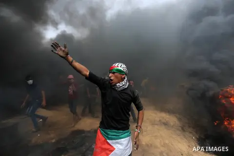Palestinian protesters gather during clashes with Israeli security forces at tents protest at the Israel-Gaza border where Palestinians demand the right to return to their homeland, in Khan Younis in the southern Gaza St...