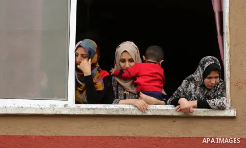 Relatives of Palestinian 29-year-old Saadi Abu Taha, who was killed at the Israel-Gaza border during clashes with Israeli security forces, mourn during his funeral in Khan Yunis in the southern Gaza strip on April 21, 20...