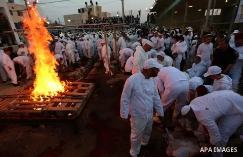 Members of the ancient Samaritan community take part in the ritual of Passover Sacrifice on Mount Grizim, overlooking the West Bank town of Nablus, April 29, 2018. Samaritans descended from the ancient Israelite tribes o...
