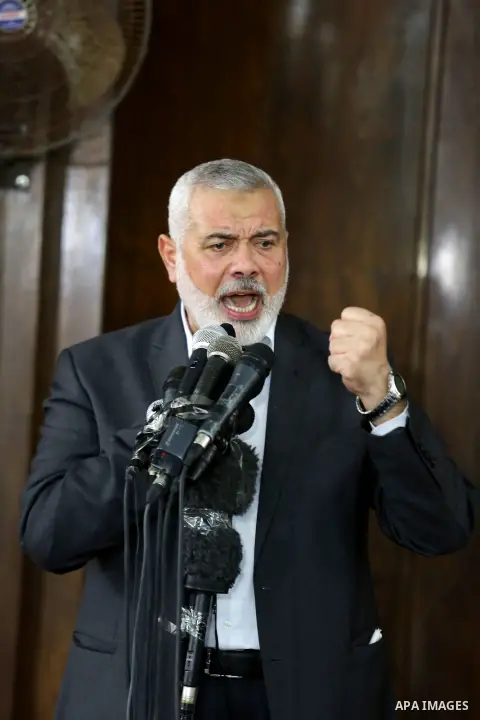 Chairman of the political bureau of the Hamas Palestinian Islamist movement, Ismail Haniyeh speaks during the funeral of six members of Ezzedine al-Qassam Brigades, the armed wing of the Palestinian Hamas movement who we...