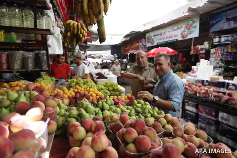 A Palestinian vendor sells Fruits at a market during the holy month of Ramadan, on May 24, 2018. Ramadan is sacred to Muslims because it is during that month that tradition says the Koran was revealed to the Prophet Moha...