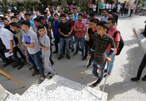 Palestinian Mohammed Musabeh, 17, a High school student, who amputated his leg after he was shot by Israeli troops during clashes in tents protest demanding the right to return to their homeland, at the Israel-Gaza borde...