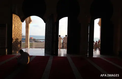 Palestinians read the Koran, Islam's holiest book, at a mosque in Gaza City during the Muslim holy month of Ramadan, on June 6, 2018. Ramadan is sacred to Muslims because it is during that month that tradition says the K...