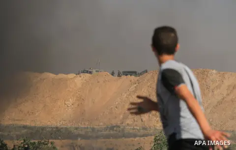 Palestinian protesters gather during clashes with Israeli troops in a protest marking al-Quds Day, (Jerusalem Day), at the Israel-Gaza border in al-Bureij in the center of Gaza Strip on June 8, 2018. Photo by Mahmoud Kha...