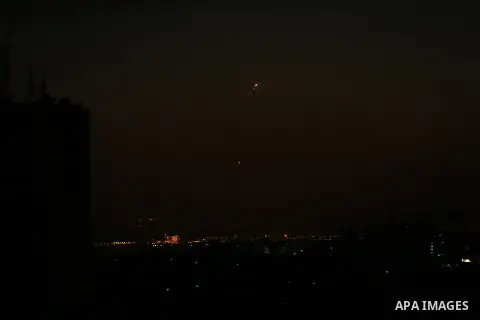 Missiles from the Iron Dome air defence system, designed to intercept and destroy incoming short-range rockets and artillery shells, from a position in the southern Israeli are seen from Gaza city on June 20, 2018. Photo...