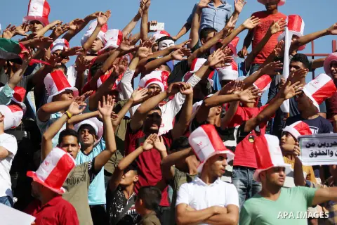 Palestinian fans attend the first leg football match of the Palestine Cup final between Hilal al-Quds football club and Shabab Khan Younis football club at the Palestine Stadium in Gaza City on June 20, 2018. Photo by Ma...