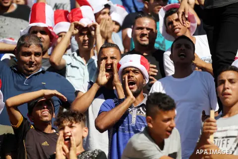 Palestinian fans attend the first leg football match of the Palestine Cup final between Hilal al-Quds football club and Shabab Khan Younis football club at the Palestine Stadium in Gaza City on June 20, 2018. Photo by Ma...