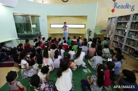 Palestinian children enjoy as part of the activities during a summer holiday, at Qattan Foundation in Gaza city, on June 21, 2018. Photo by Mahmoud Ajour