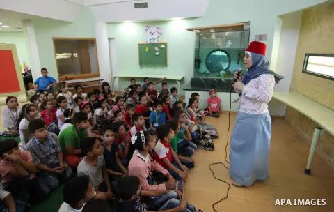 Palestinian children enjoy as part of the activities during a summer holiday, at Qattan Foundation in Gaza city, on June 21, 2018. Photo by Mahmoud Ajour