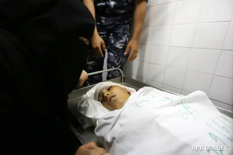 Relatives of 14-year-old Palestinian boy Yasser Abu Al-Naja, who was killed by Israeli troops during clashes in tents protest where Palestinian demand the right to return to their homeland at the Israel-Gaza border, mour...