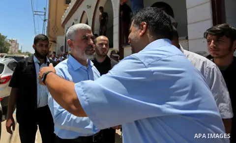 Hamas's leader in the Gaza Strip Yahya Sinwar participates in the funeral of 14-year-old Palestinian boy Yasser Abu Al-Naja, who was killed by Israeli troops during clashes in tents protest where Palestinian demand the r...