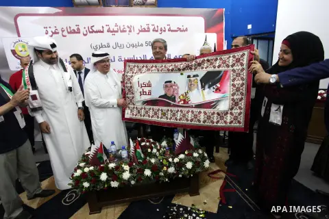 Qatar's Ambassador to the Palestinian Authority, Mohammed Al Emadi attends the ceremony of provide a grant to support the fees of Palestinian needy students at Al-Aqsa University, in Gaza city on June 30, 2018. Photo by...