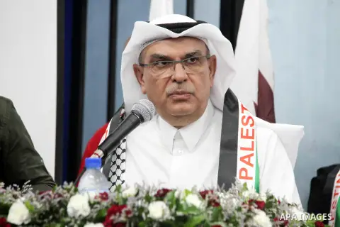 Qatar's Ambassador to the Palestinian Authority, Mohammed Al Emadi attends the ceremony of provide a grant to support the fees of Palestinian needy students at Islamic University, in Gaza city on June 30, 2018. Photo by...