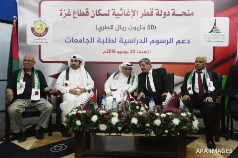 Qatar's Ambassador to the Palestinian Authority, Mohammed Al Emadi attends the ceremony of provide a grant to support the fees of Palestinian needy students at Al-Aqsa University, in Gaza city on June 30, 2018. Photo by...