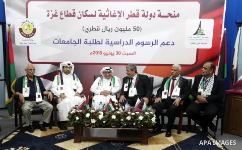 Qatar's Ambassador to the Palestinian Authority, Mohammed Al Emadi attends the ceremony of provide a grant to support the fees of Palestinian needy students at Al-Aqsa University, in Gaza city on June 30, 2018. Photo by...