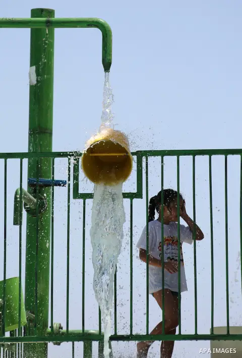Palestinians swim in the water city "Safari Aqua Park" during the summer holiday, in the West Bank city of Jericho, on July 2, 2018. Photo by Shadi Hatem