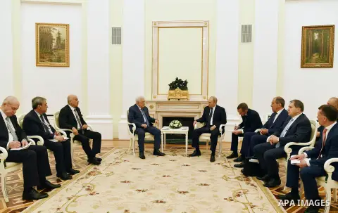 Palestinian President Mahmoud Abbas meets with Russian President Vladimir Putin at the Kremlin in Moscow on July 14, 2018. Photo by Thaer Ganaim